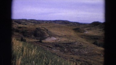 1967: Grassland Vast Area Sunlight and Mountains Yellowstone, Wyoming