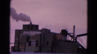 1967: a morning, factory building and logs of wood