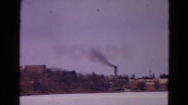 1967: steam rising out of a factory chimney YELLOWSTONE, WYOMING