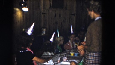 1961: vintage video of a girl opening a present at her birthday party