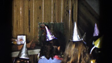 1961: children wearing birthday hats gathered in a cluster MICHIGAN