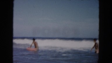 1961: surfers at the beach in the morning MICHIGAN