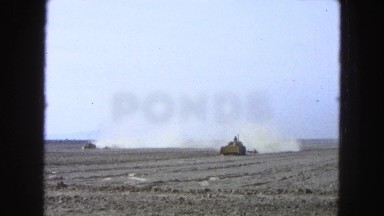 1965: two tractors plowing a field MEXICO