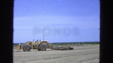 1965: large farm or industrial equipment in field ready for planting MEXICO