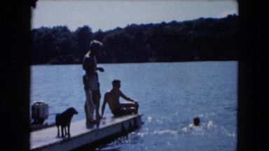1961: a group of people enjoying a beautiful day at the lake MICHIGAN