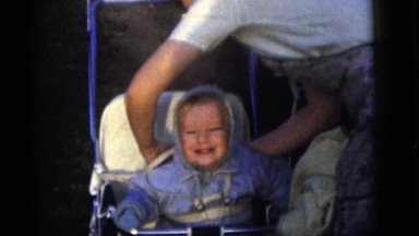 1964: mom getting brood ready for chilly morning stroller walk CAMDEN