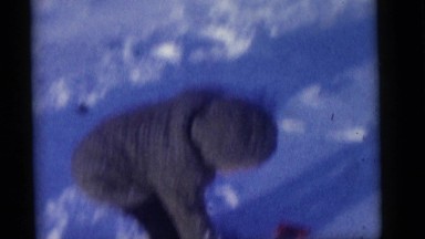 1964: the children play on the first evening of snow fall CAMDEN, NEW JERSEY