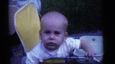 1964: various cute toddlers and babies outdoors playing in the sun CAMDEN