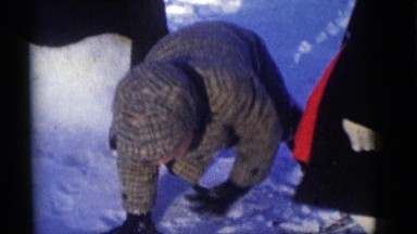 1964: the snow and little baby having good time having fun