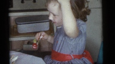 1964: two little children sitting at the table during a party CAMDEN, NEW JERSEY