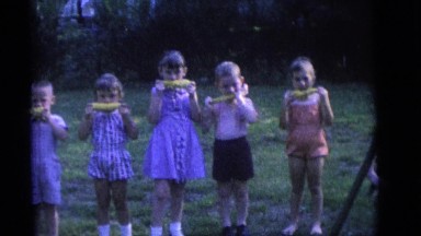 1964: children eating play outdoor near garden walk down CAMDEN, NEW JERSEY