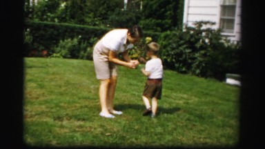 1956: father child talk play outdoor garden working BOSTON