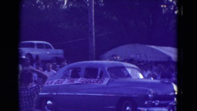 1965: festival of different transportation including cars and horses DILLER