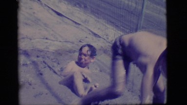 1968: children playing in the mud COTTONWOOD, ARIZONA