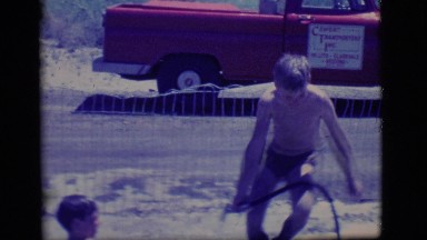 1968: two boys playing in the yard with a house COTTONWOOD, ARIZONA