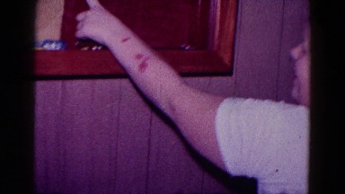 1968: a young boy showing off his model cars displayed on wall shelves MINNESOTA