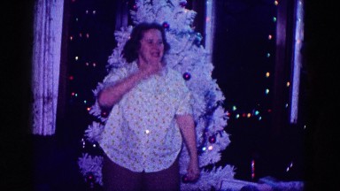 1968: christmas scene mother cheered indoor party, MINNESOTA