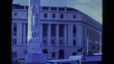 1969: beautiful and unique statue stands in front of an impressive building
