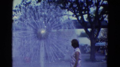 1969: woman pose beside fountain dressed pretty DILLER, NEBRASKA
