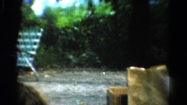 1954: Older Woman Smoking Cigar in Ohio Outdoor Setting