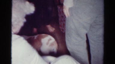 1954: dog plays with its family between presents and an old lady OHIO