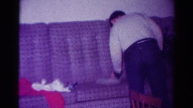 1954: getting ready for the holidays having fun in family with the christmas
