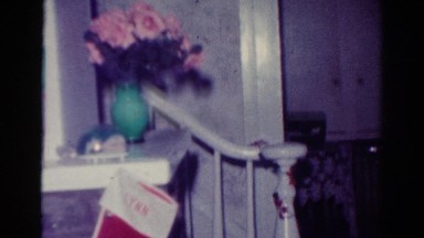1954: the interior of a home starting with christmas stocking hanging