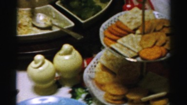 1956: a picnic table loaded with wonderful food and refreshments for guests