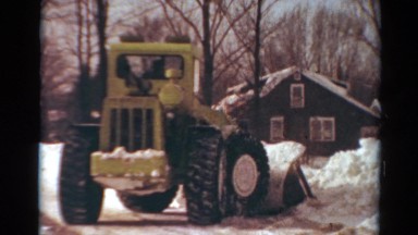 1954: snow tractor clean push away drag piles covered road clean NEW YORK