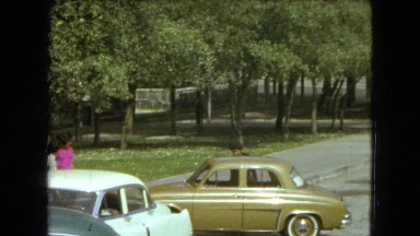 1962: people step outside of their parked cars. MEXICO
