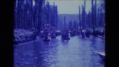 1962: several rowing boats on a lake in a tropical location MEXICO
