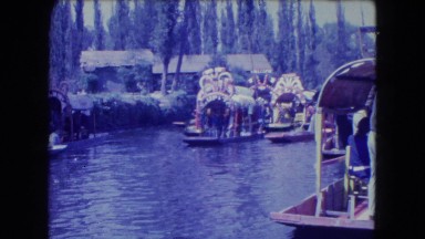 1962: boat rowing tourists in the water MEXICO