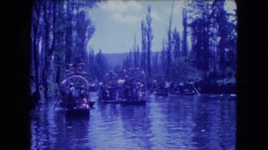 1962: people rowing boats floating on water. MEXICO