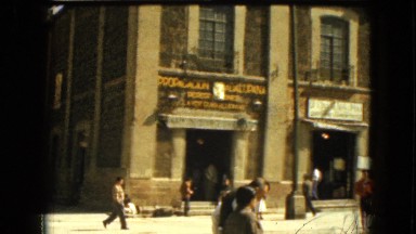 1962: people are walking by the gorgeous architecture downtown MEXICO