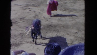 1962: A Man Playing With Bull and Red Rag in San Pedro, California