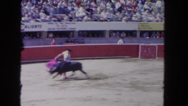 1962: Man Entertaining Crowd by Tricking a Bull and Making It Angry in San Pedro