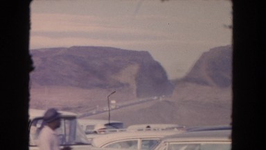 1962: desert sand caged outdoor daylight people watch SAN PEDRO, CALIFORNIA