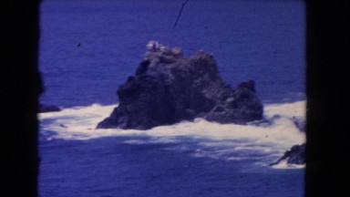 1962: rock at the middle of the sea and weaves around the sea and crystal clear