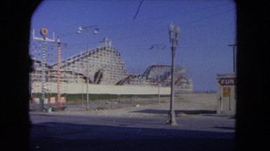 1962: a large roller-coaster, which appears to be location on a beach SAN PEDRO