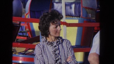 1962: adult men and women are standing watching a show SAN PEDRO, CALIFORNIA