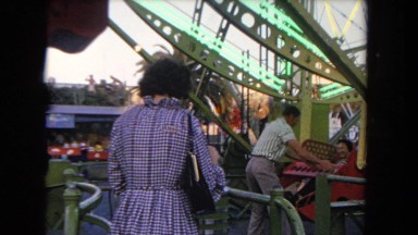 1962: roller coasters and park family is having fun SAN PEDRO, CALIFORNIA