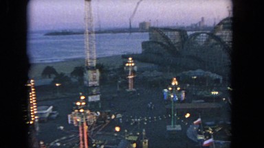 1962: amusement parks amazing rides flags hoisted lightening beautiful view