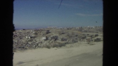 1962: a rugged dirt road cutting through the mountains