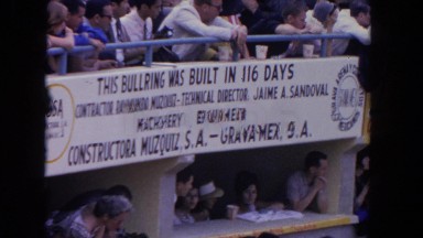 1962: a large group of people watching from the stands at a bullring SAN PEDRO