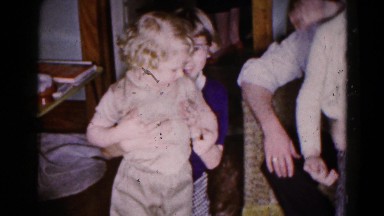 1959: indoor party drinks talk dressed enjoyment family father daughter