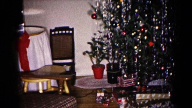 1959: indoor viewing christmas tree gifts around