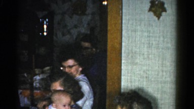 1962: family gathered in the dining room of the house and chatting CATSKILL