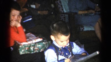 1962: the little boy loves the present he received for the holiday CATSKILL