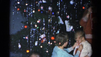 1962: christmas scene mother cheered indoor party