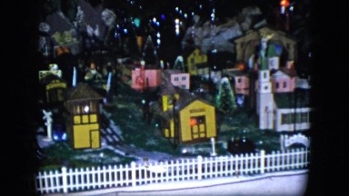 1951: A Cute Miniature Train Moving on a Track Under a Christmas Tree Cleveland